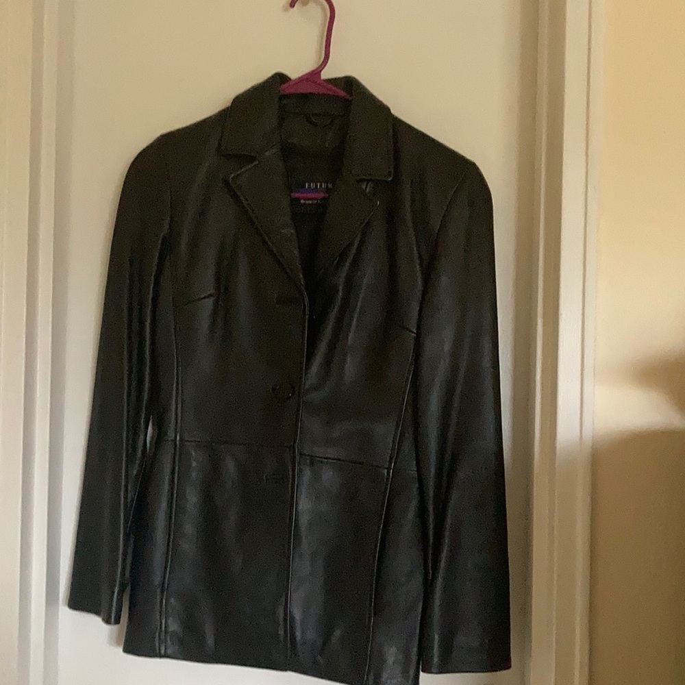 Black leather jacket hip length with removable lining worn2x great condition XS